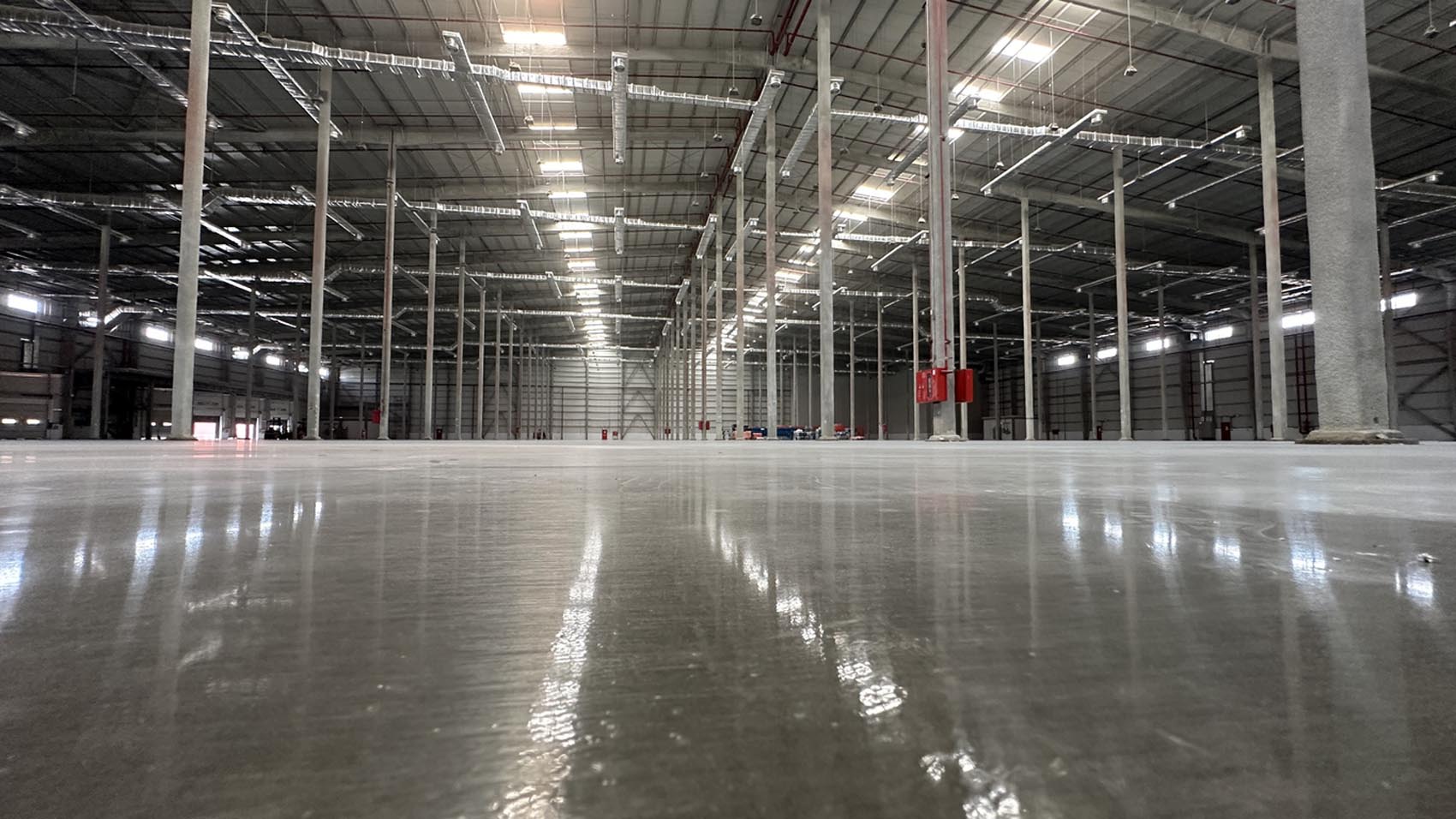 Industrial building or modern factory for manufacturing production plant or large warehouse, Polished concrete floor clean condition and space for industry product display or industry background.